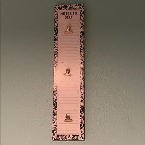 Plaque with clips on it